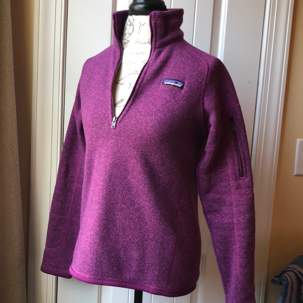 Patagonia purple pullover with zipper.